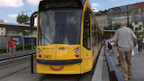 A villamos is mosolyog